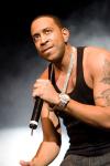 Luda flashes his tatts