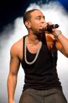 Luda flashes his tatts