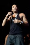 Luda flashes his tatts