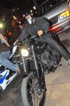 T.I. arrives on his Harley