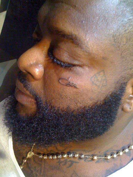 rick ross tattoos on face. My bodacious boo Rick Ross