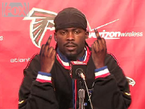 Michael Vick gives haters the finger!